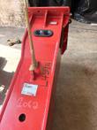 Red breaker from the mounting end: plate holes, rubber grommet and data plate
