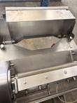Stainless feed tray and guard above the dual rollers of a meat tenderizer