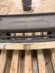 Center grille and lower chrome section of the front bumper
