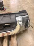 Right corner of the chrome front bumper