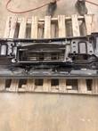 Back of the bumper's center with grille frame and support structure