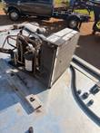 Compressor, refrigerant receiver and condenser coil with copper lines on top of the cooler