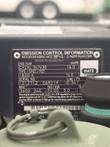 Hatz engine emission-control plate on the fuel transfer skid