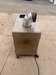 Smoker end view with foil-wrapped vent elbow, power cord and locking casters
