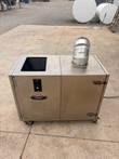 Stainless smoker from the front with a foil-wrapped vent elbow and open hopper on top