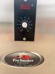 Smoker control panel close-up: red display, 0-10 dial and Pro Smoker 'N Roaster logo