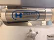 Hinds-Bock logo on the stainless pneumatic cylinder of the depositor, Food Maker plate at lower right