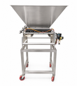 Stainless steel pneumatic piston depositor with large hopper on a stainless stand with red casters