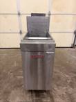 Vulcan stainless steel floor fryer, front view, red logo on the door, open tank and splash back