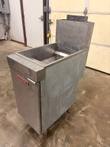 Vulcan stainless floor fryer from the door side, open tank and rear flue, worn side panel