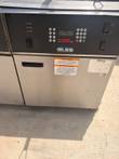 Giles fryer control panel with keypad, timer display and heat switch above the cabinet door