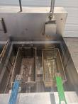 Giles fryer vat with two wire baskets, top view