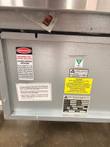 Galvanized compressor housing with warning, grounding and Atlas Metal Industries refrigeration labels and data plate