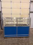 Atlas Metal 5-pan cold food counter, straight-on front with blue panels and two-tier glass sneeze guard