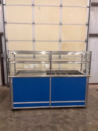 Atlas Metal 5-pan cold food counter, straight-on front with blue panels and two-tier glass sneeze guard