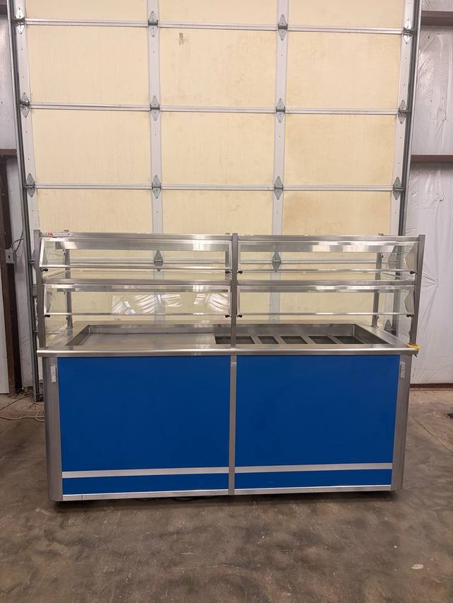 Atlas Metal 5-pan cold food counter, straight-on front with blue panels and two-tier glass sneeze guard