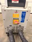 Front of the EFD #4 generator cabinet with main switch, labels, two HHT output ports and cooling hoses