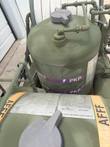 PKP dry chemical tank with purple PKP bands above the AFFF foam tank, top-down view on the skid.