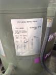 PKP level refill table plate on the dry chemical tank, with a flame-resistant hose beside it.