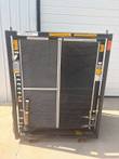 Front of the whole chiller in its steel frame: two mesh coil guards, controls left, gauge and valves right.