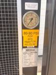 Koolant Koolers LKV10000-GE data plate: 10 HP compressor, 2 HP pump, R407C, 460V 3-phase, beside a pressure gauge.