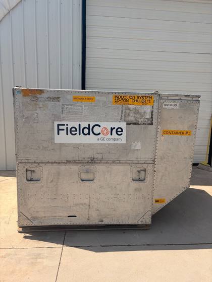 Aluminum shipping container with FieldCore logo, three latch handles on the lower door and a Container #1 label.
