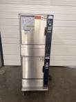 Groen double-stack boilerless steamer, front view, two stainless doors with blue control panels