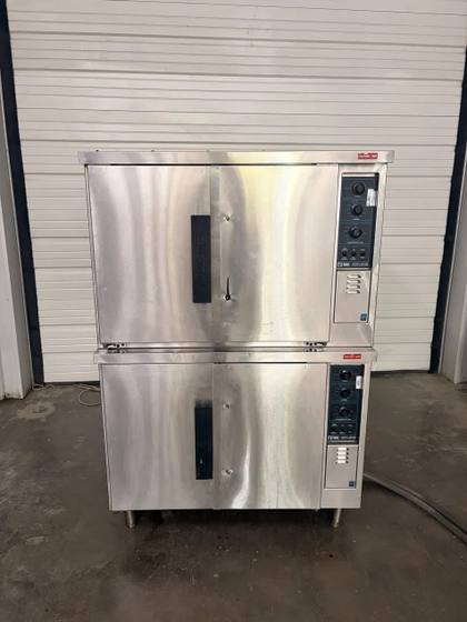 Lang double-stack convection oven, front view, closed stainless doors with control panels