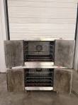 Lang double-stack convection oven with all four doors open, wire racks visible in both cavities
