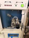 Jasco pump front panel with inlet port lights and degasser button above the open pump heads