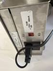 Rear of the stirrer with fuse label, red 230V selector, power inlet and cord