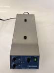 Techne MCS-102L Biological Stirrer, stainless steel top with two black knobs, blue control panel, cord trailing behind