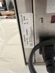 Rating label on the stirrer housing beside the power cord, model FMCS102L, 120 or 230 V, 50-60 Hz
