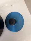 Blue Beckman lid with black knob lying beside the rotor body, engraved J Series text visible