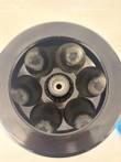 Inside of the JLA 16.250 rotor from above, six numbered tube wells with residue at the bottoms