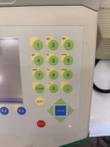 iCycler keypad with green number keys, yellow Shift key, arrow pad with blue Enter, red Stop button