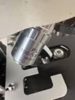 PL 100/1.25 oil immersion objective, 160/0.17 marking, above the stage opening