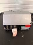 Rear of the silver monitor with BNC analog ports, RS-485 ports, power switch and data label