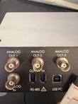 Monitor rear ports: three analog BNC outputs, an analog input, RS-485 in and out, and USB PC