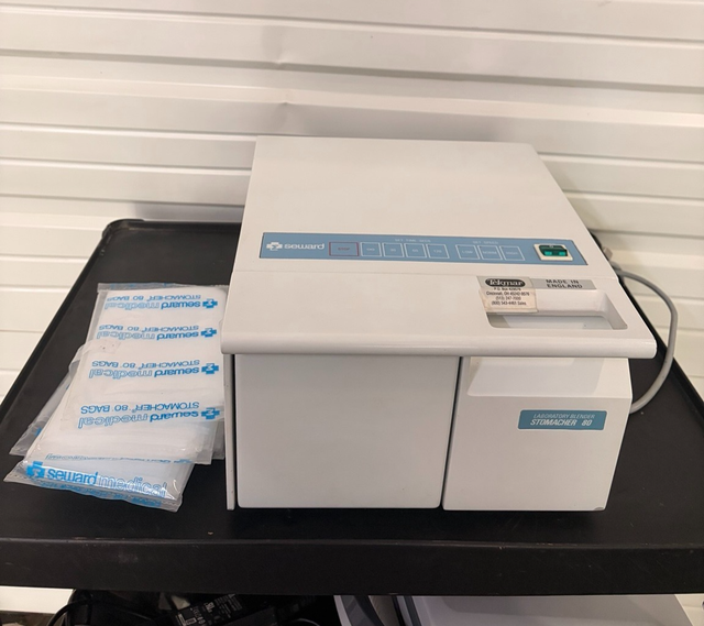 Seward Stomacher 80 laboratory blender on a cart with bags at left
