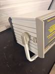 HDI PulseWave CR-2000 housing from the side with carry handle, screen at the right edge