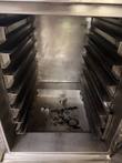 Inside the Winston CVap cabinet: stainless side rack rails and dark residue on the bottom pan