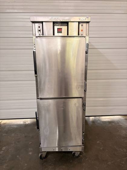 Winston CVap holding cabinet, stainless steel with two half-doors, black handles and casters, doors closed