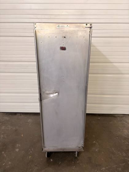 Front of EPCO holding and proofing cabinet on casters, closed aluminum door with latch and EPCO plate at top