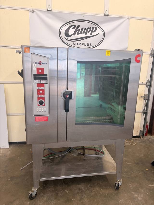 Convotherm combi oven steamer on a stainless stand with casters, door closed