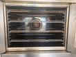 Blodgett convection oven interior with four racks and rear fan