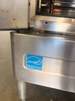 Energy Star label on the base panel of the Blodgett oven next to a leg