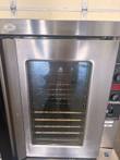 Stainless steel convection oven front with glass door, five racks inside and control panel at right edge