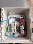 Open control enclosure with DIN-mounted I/O module, 30 W power supply, breaker and terminal blocks