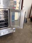 Lang double-stack oven with lower door open, showing wire racks and the door glass